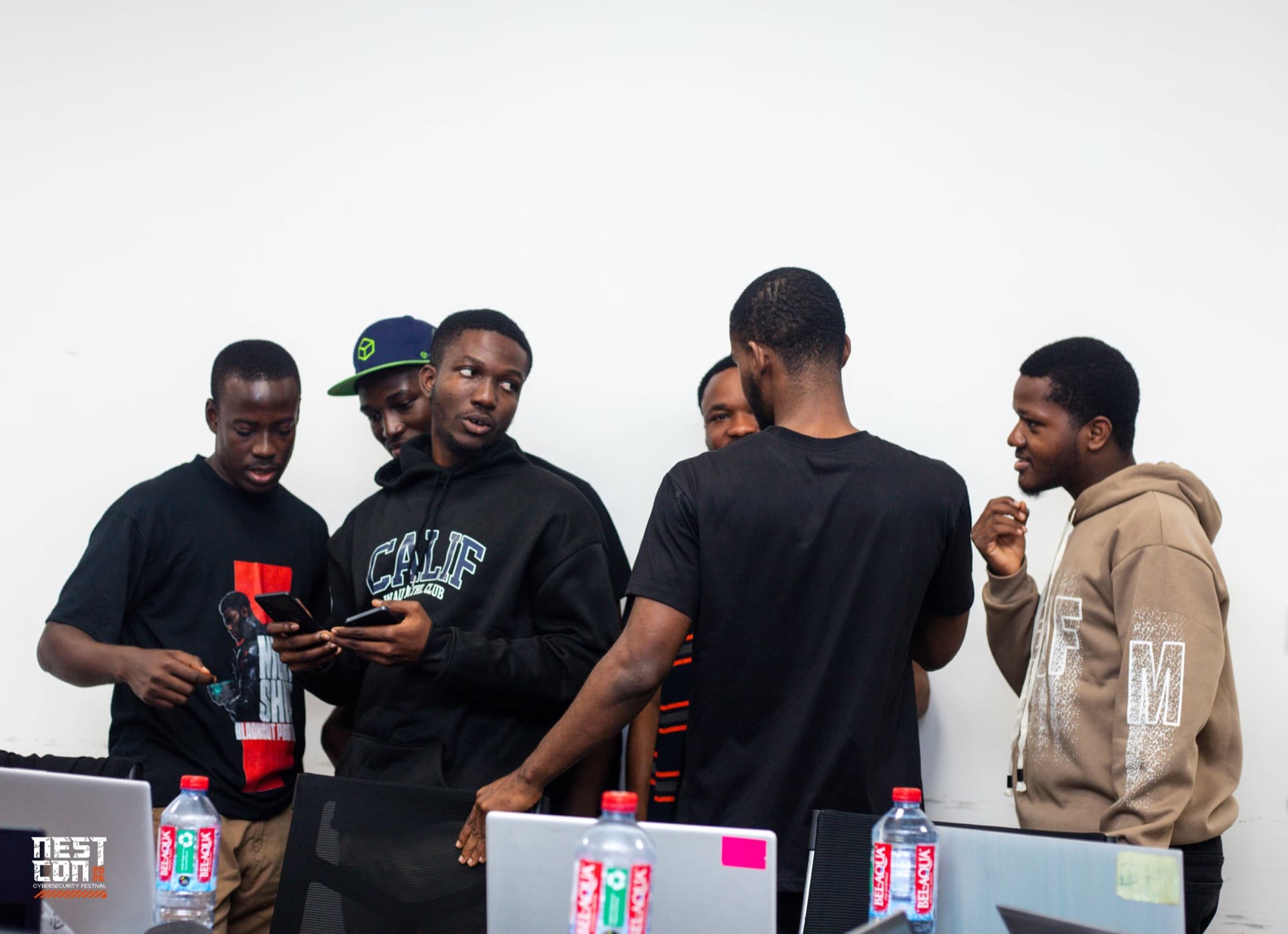 A group of NESTCON attendees networking together between sessions.
